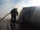 В мережі з'явилося відео тушіння пожежі з даху ринку 